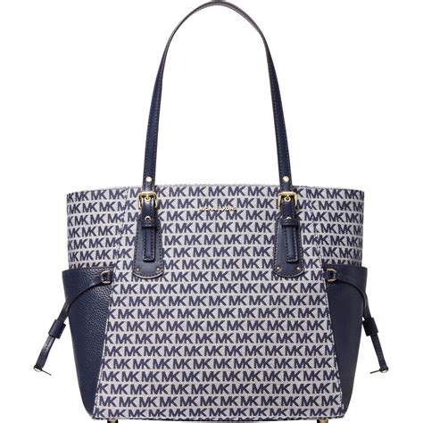 michael michael kors east-west signature tote|signature voyager east west tote.